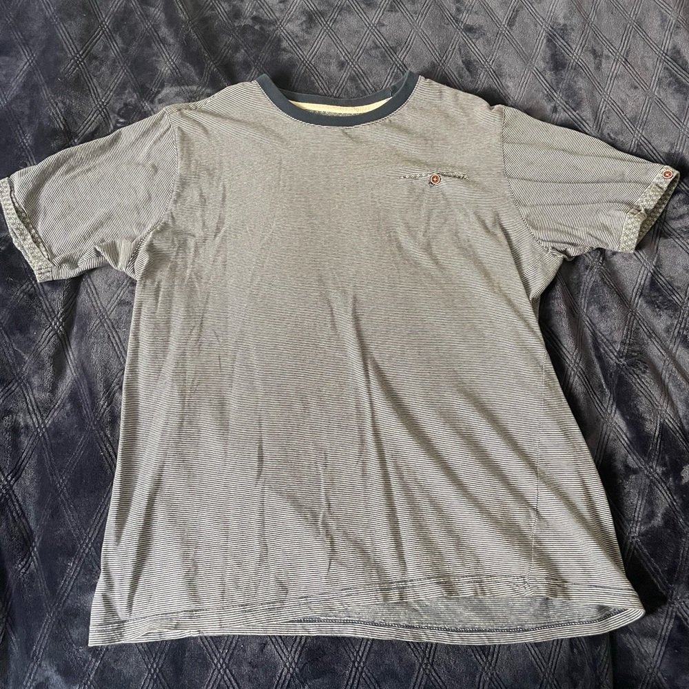 Large stripped shirt.